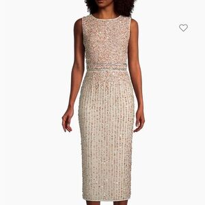 Beautiful sequins dress pale pink and cream. Worn once excellent condition.